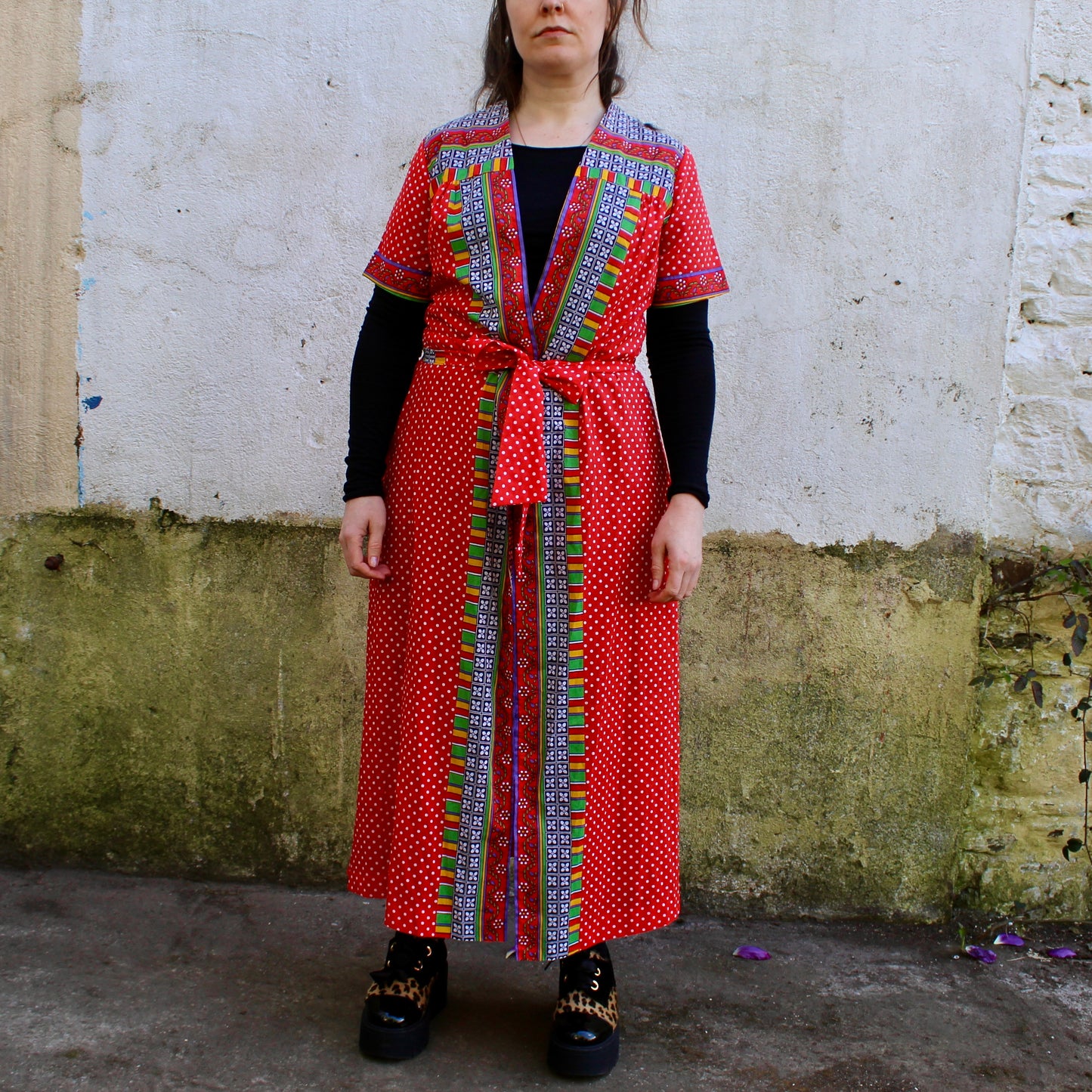 Red robe with white polkadot and floral panels