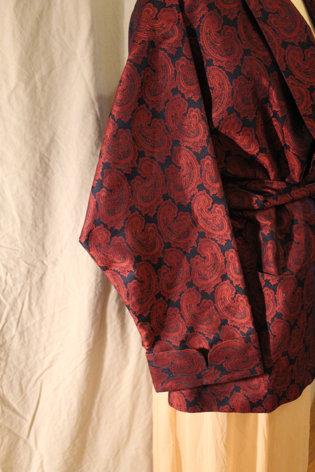 Structured black smoking jacket robe with wine paisley