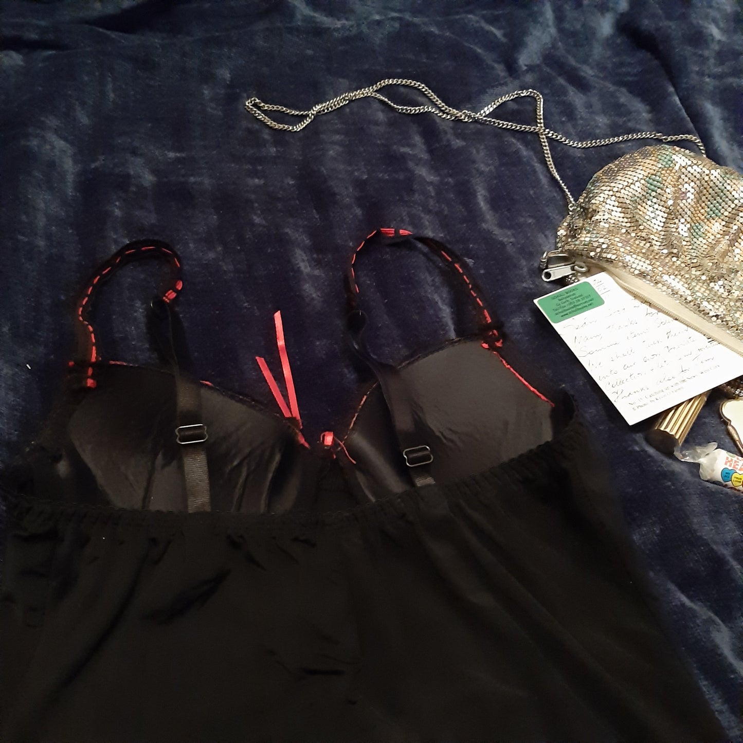 Lacy black slip with red accents