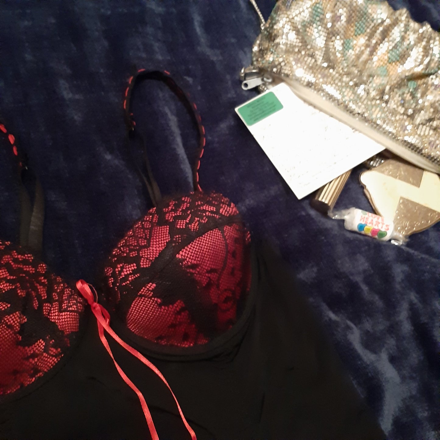 Lacy black slip with red accents