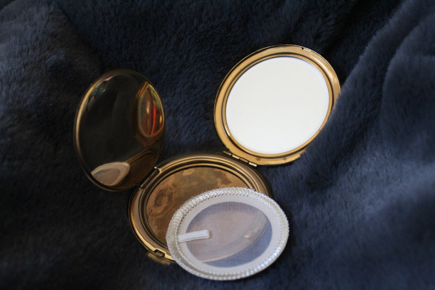 Mystery compact with dragon pattern