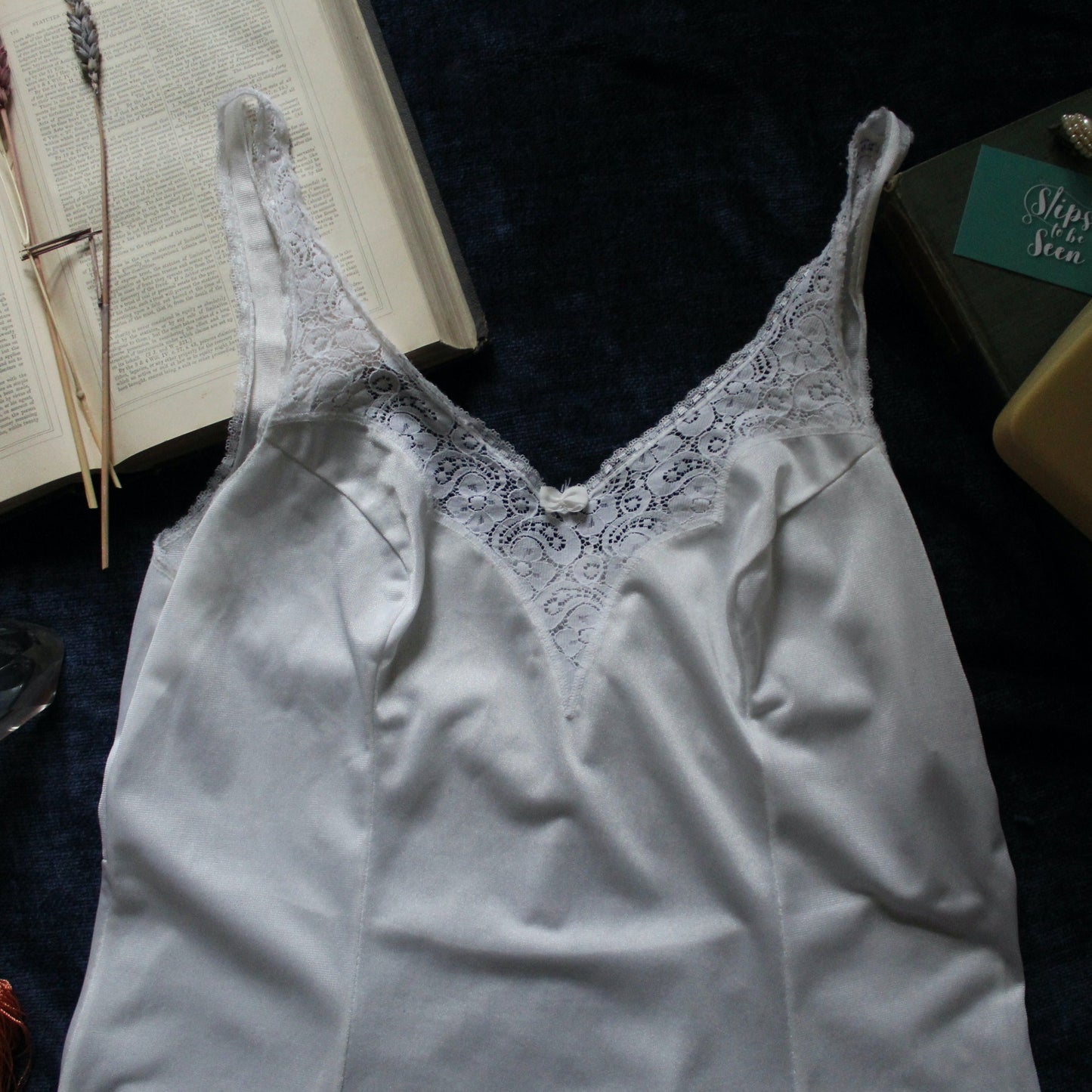 Pearl slip with angular floral trim