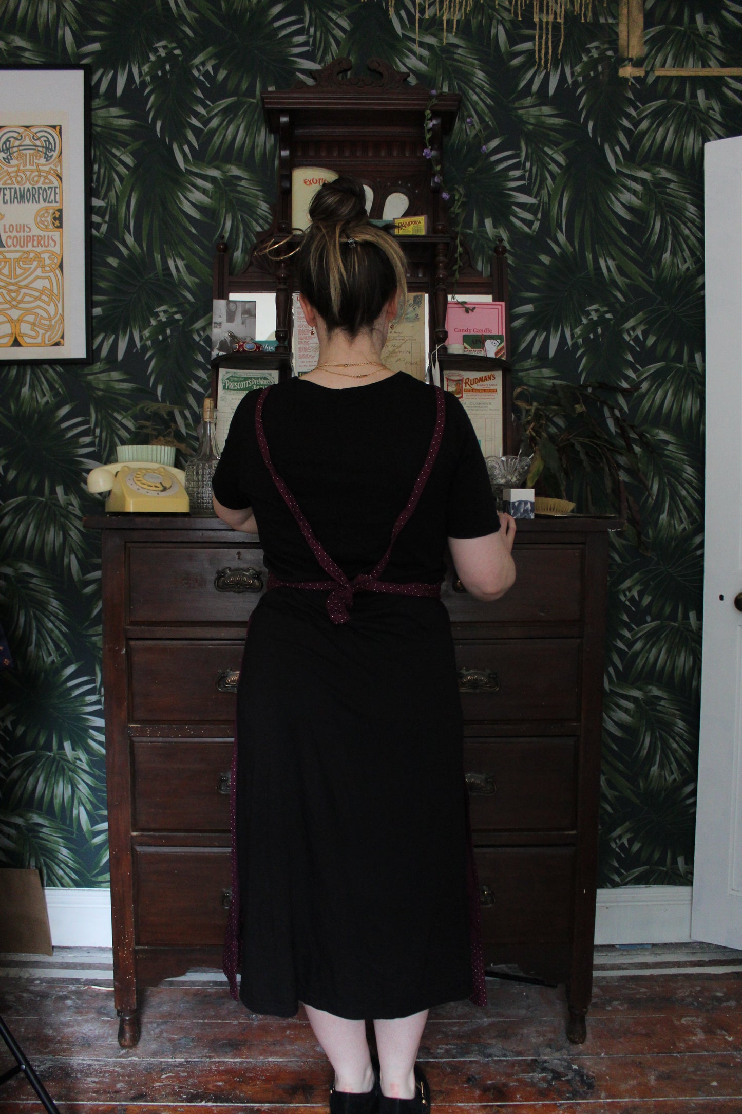 Long fuchsia half apron with white polka dot