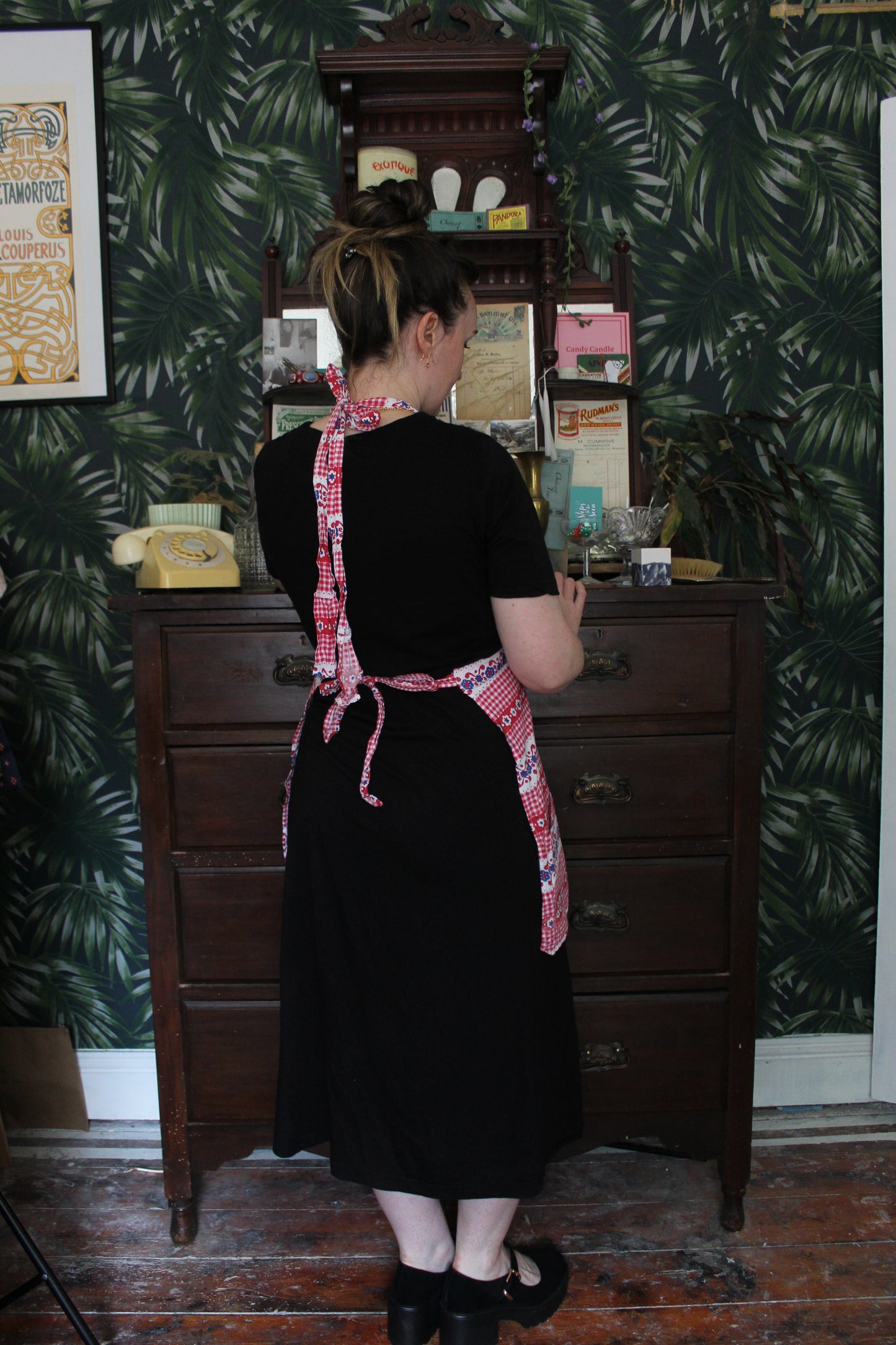 Red and white check apron with blue flowers