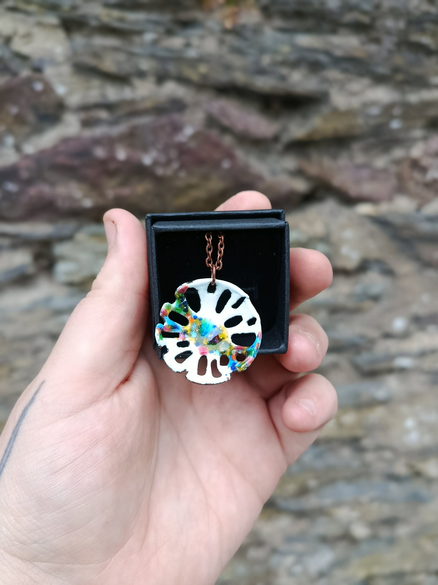 Enamel Pendant with rainbow splatter on white CHP1