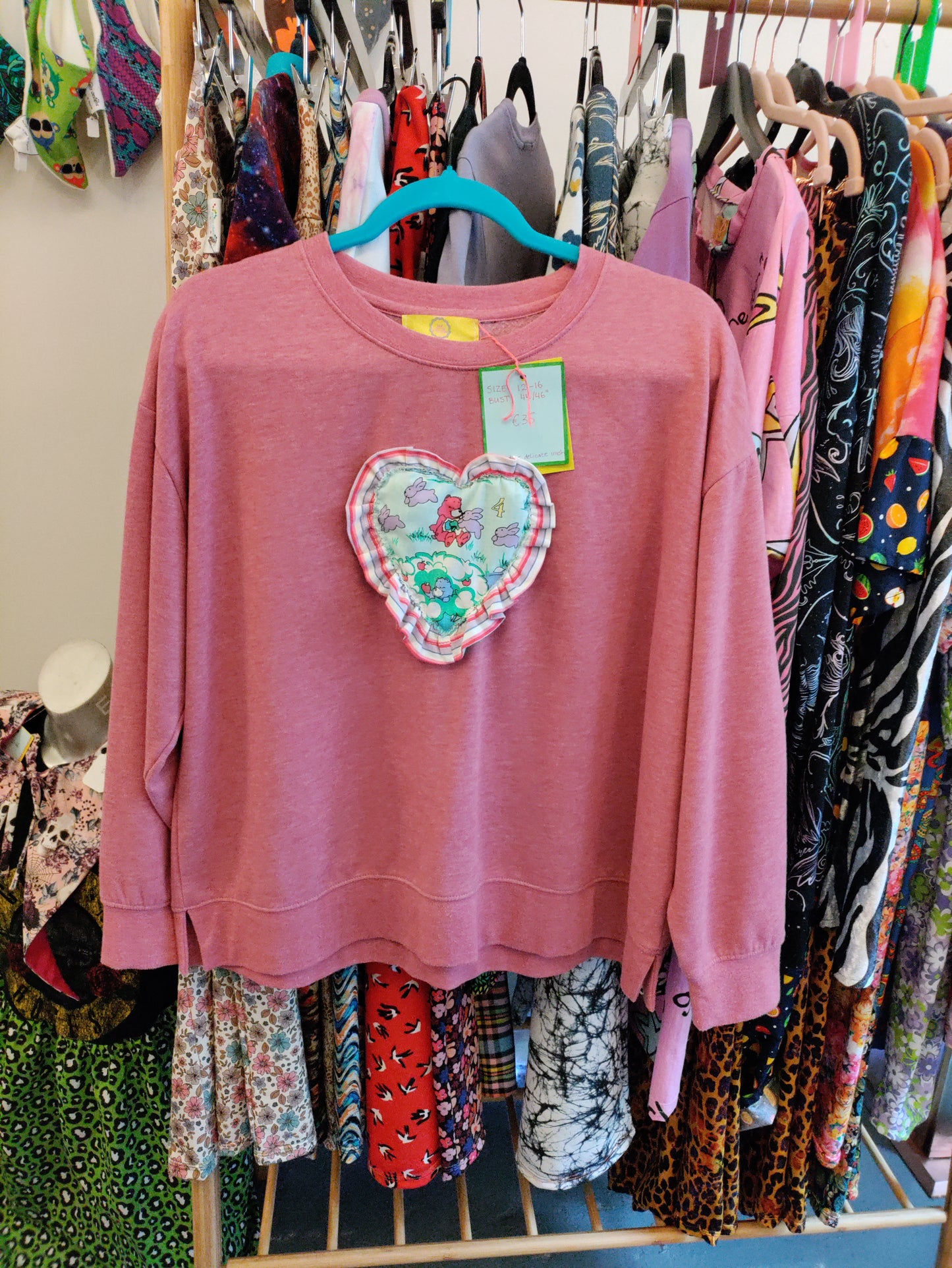 Big cutie Stitches care bear jumper fits up to size 16