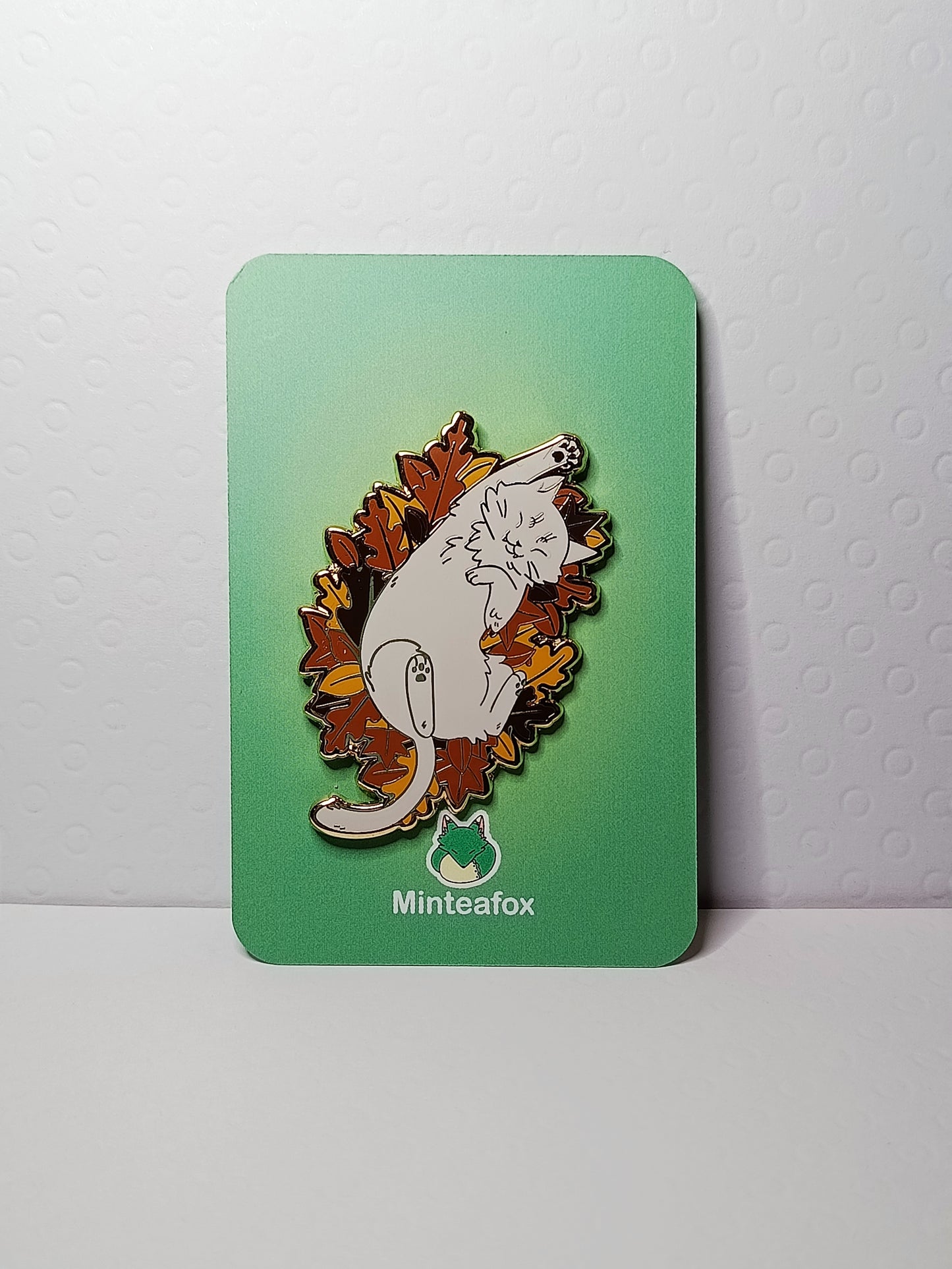 Cat in Leaves Enamel Pin