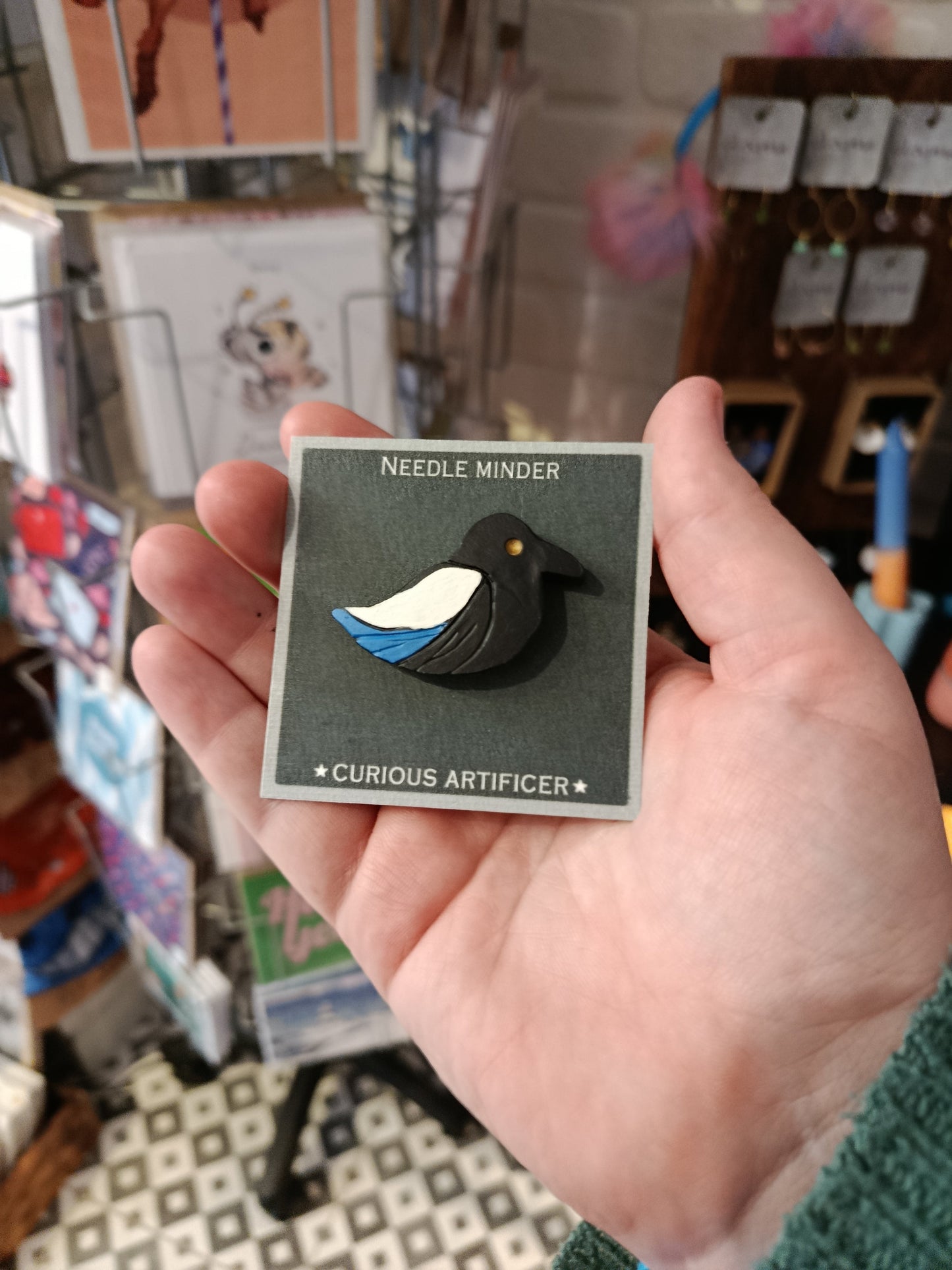 Needle minder