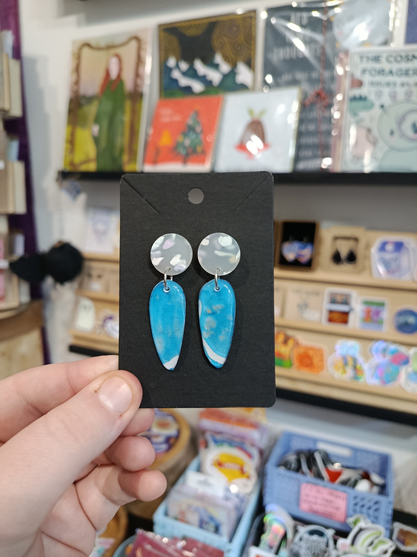 Blue elongated teardrop