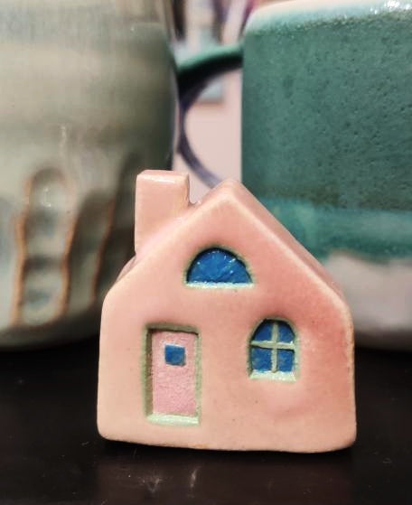 Pink Ceramic House With pink door