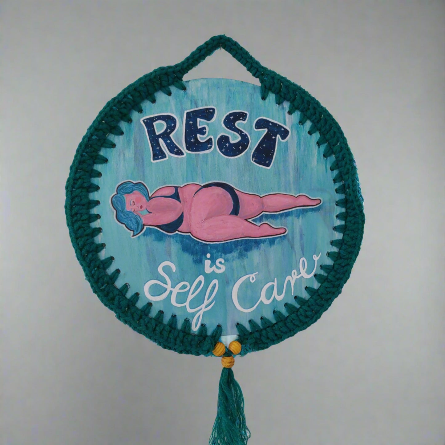 'Rest is self care' wall hanging