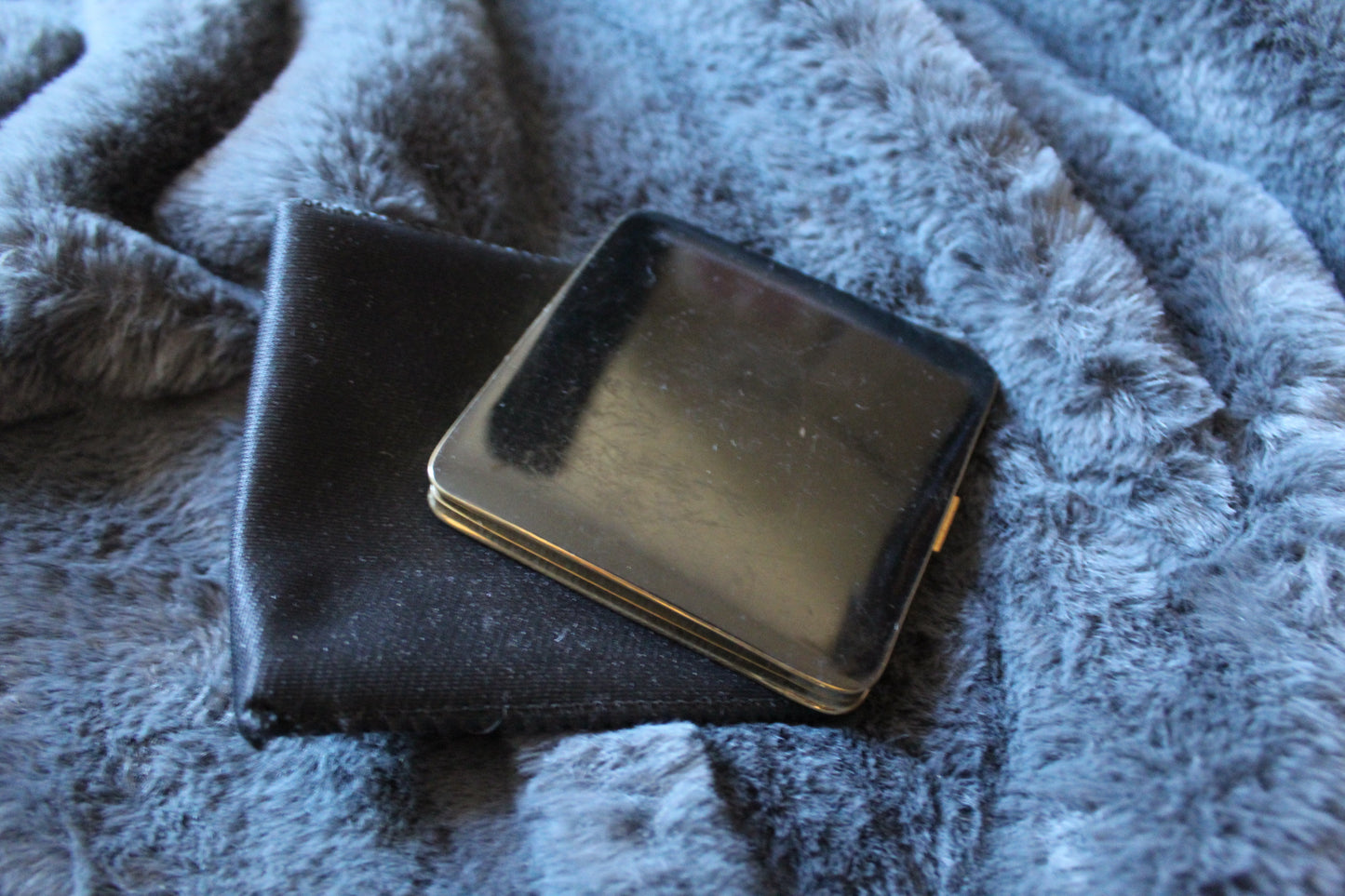 Black vintage compact with stone design