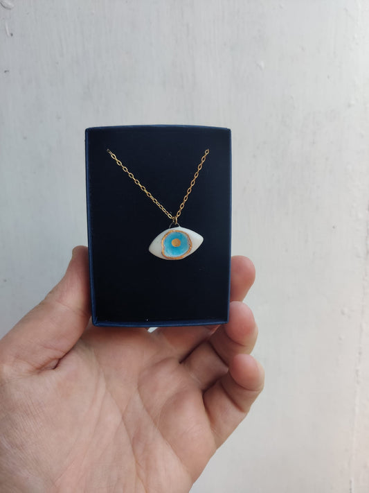 Necklace with evil eye charm