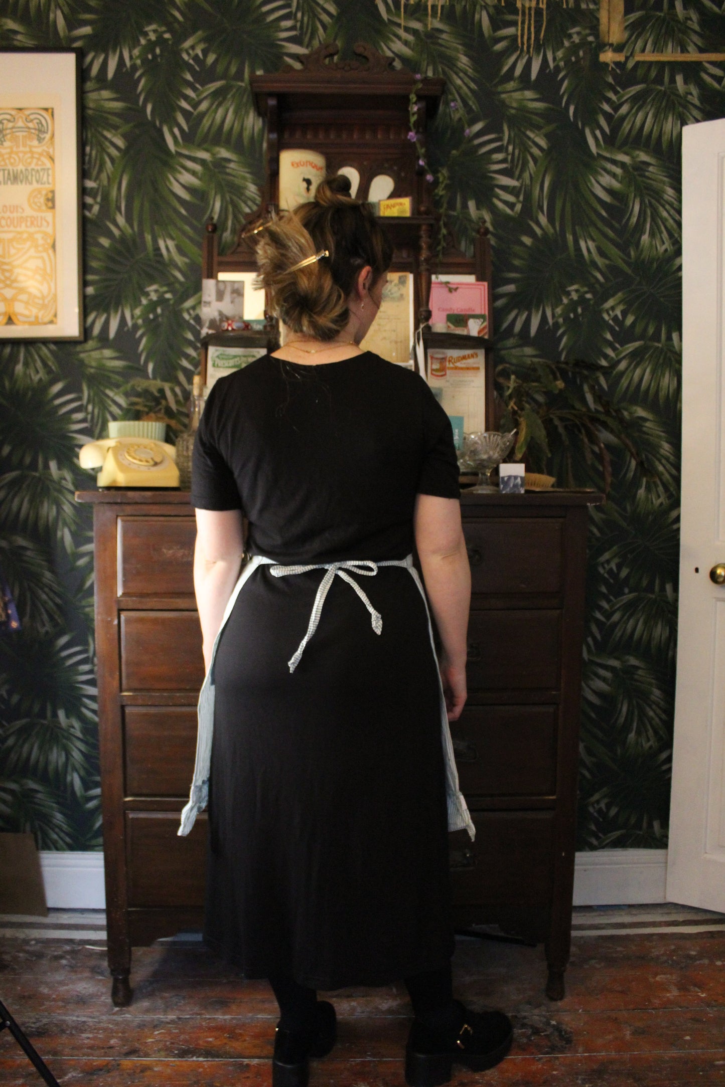 Blue and white striped half apron