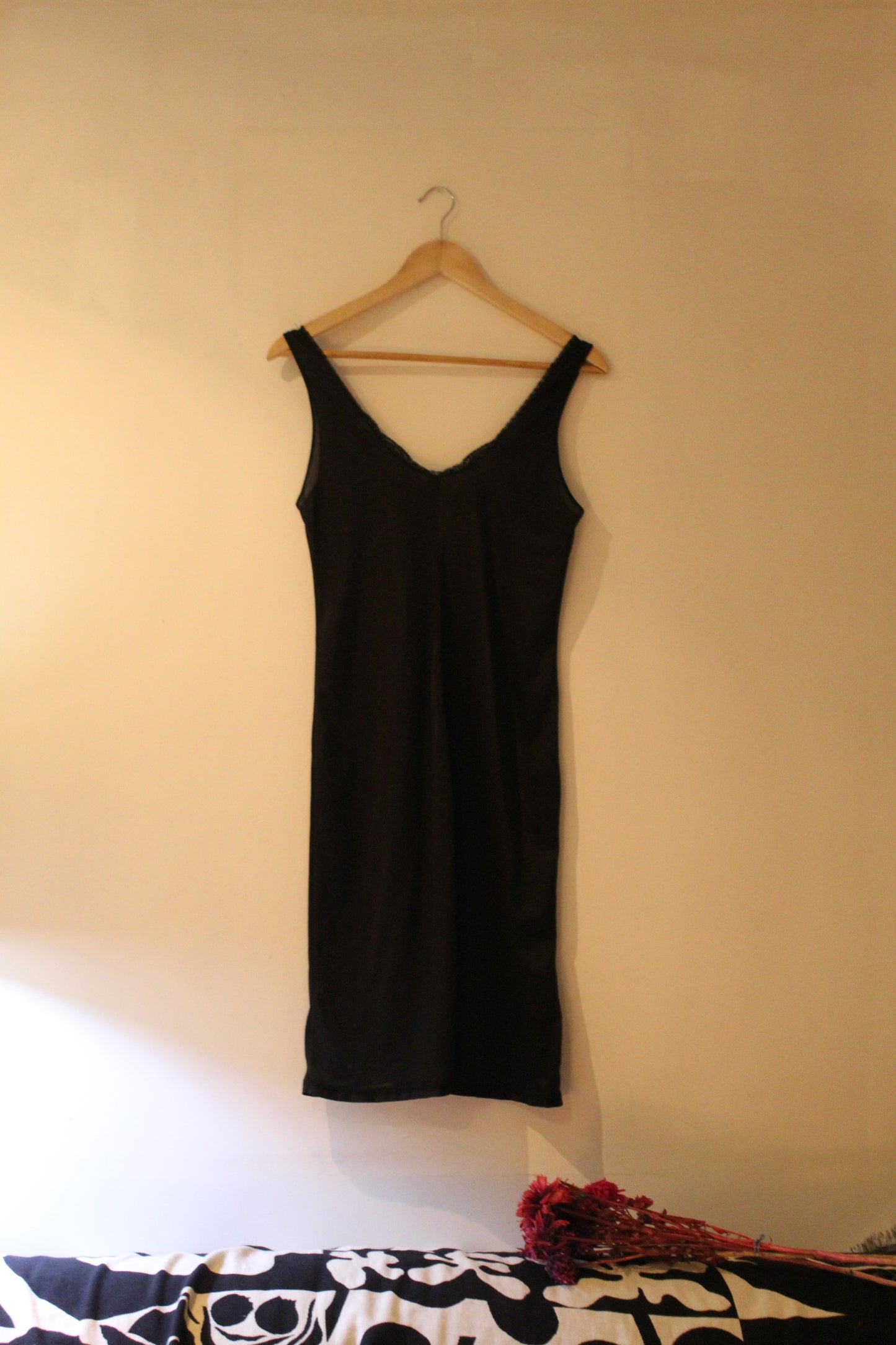 Slinky black slip with butterfly lace at bust