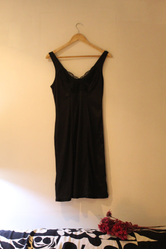 Slinky black slip with butterfly lace at bust